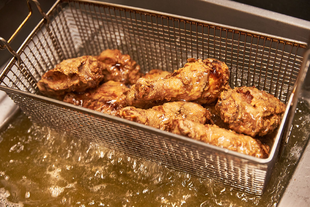 Chicken frying in cottonseed oil